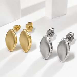 Pendientes de tuerca con diseño de marquesa, de acero inoxidable con baño de oro de 14K al vacío, pendientes minimalistas con forma de hoja, en oro y plata. - Product Image 1
