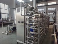 Stérilisateur de type tube de pasteurisateur Ultra-haute température entièrement automatique pour les fruits de boissons de jus de lait de miel
