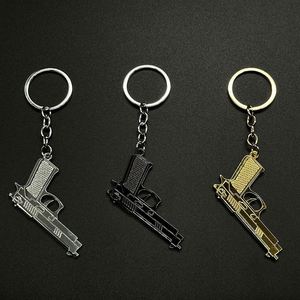 พวงกุญแจปืนจำลองคุณภาพสูง ผลิตจากโลหะผสมสังกะสีขนาดเล็ก เหมาะสำหรับเป็นของขวัญส่งเสริมการขาย - Product Image 4