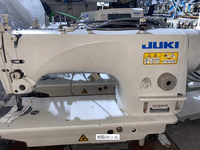 Machine à coudre JUKI à grande vitesse à entraînement direct Machine à coudre automatique à une aiguille Dln-9010ss Dln-9010a
