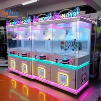 Lifun Spin-N-Drop Machine à pinces de jeu, distributeur de prix avec 40 crochets suspendus, de qualité commerciale, à monnayeur, pour divertissement et jeux de hasard