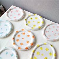 Assiette plate hautement esthétique de forme irrégulière, motif extraterrestre, décoration sous-glaçure, motif végétal, compatible micro-ondes, style Ins, pour petit-déjeuner
