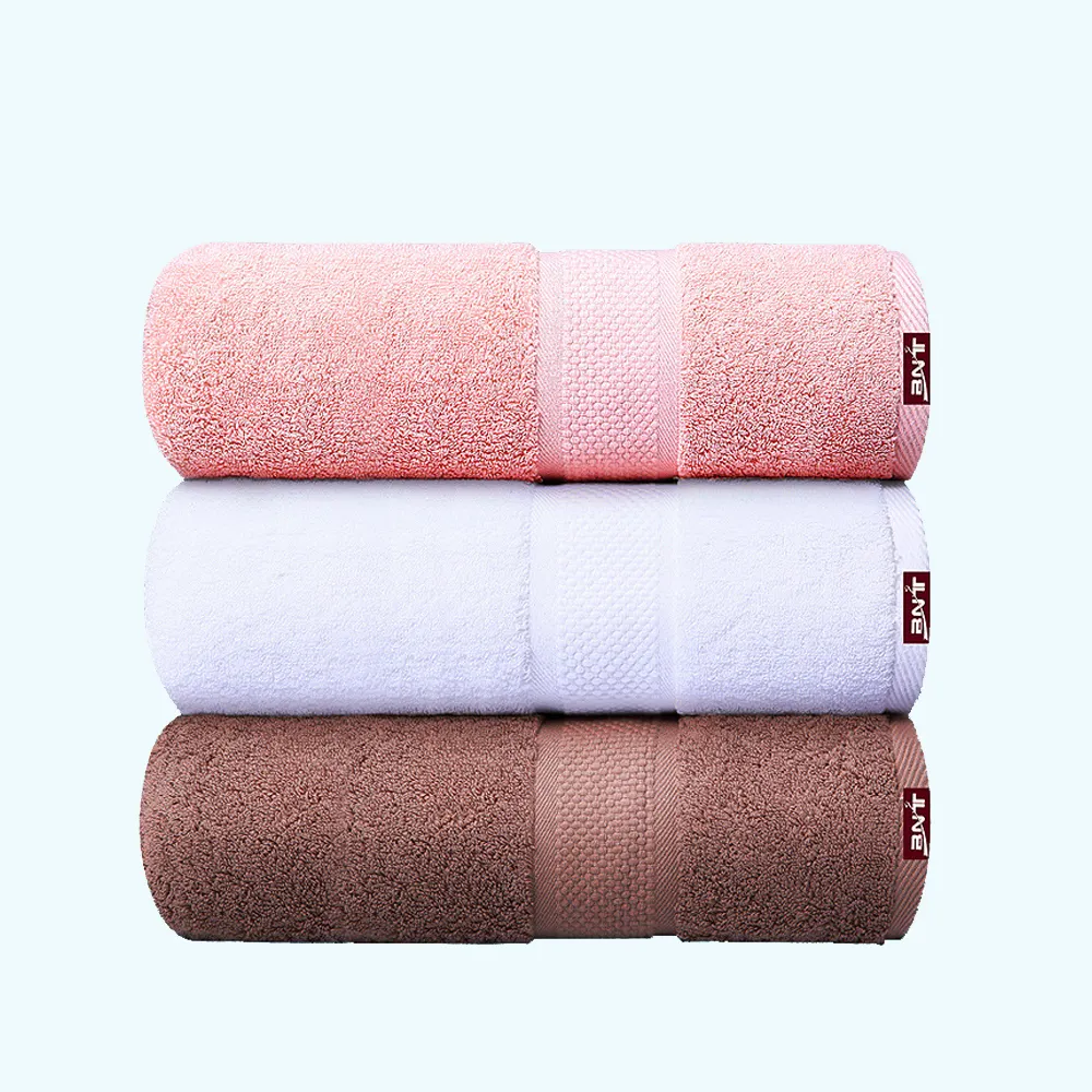 Offres Spéciales 5 étoiles de luxe serviette textile à la maison ensemble 100% coton 140*70 serviette de bain avec logo personnalisé modèles serviette de plage en coton blanc