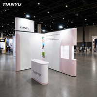 Stand pop-up TIANYU, toile de fond graphique personnalisée, comptoir d'information portable, structure en aluminium, pour événements commerciaux et marketing.