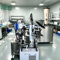 Machine de marquage laser UV pour plastique, machine de marquage permanent synchrone des surfaces intérieures et extérieures pour flacons cosmétiques