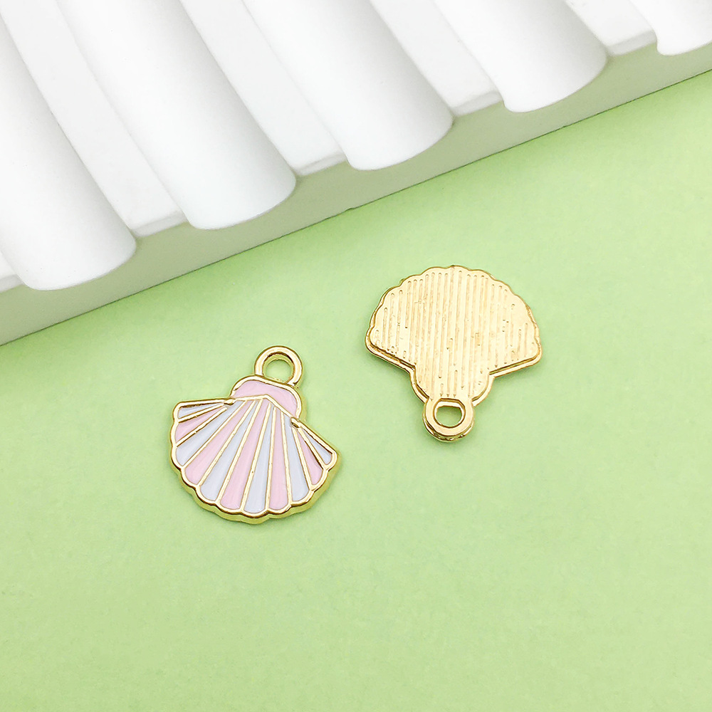 One pink seashell (13*13mm) - 0.9g - 10991