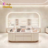 Comptoir d'exposition LED personnalisé pour magasin de cosmétiques, unité d'étagères murales écologiques pour boutique de beauté