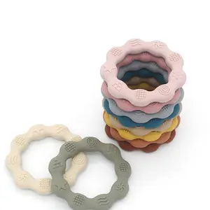 실리콘 도넛 아기 Teether 장난감 Teether 스트랩 모양 나무 도매 솔리드 태양 토끼 스타 Bpa 무료 실리콘 부드러운 장난감 JINHONG-01