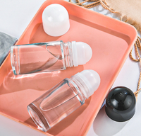 Vente en gros de flacons roll-on en verre transparent de 30 ml et 50 ml pour huiles essentielles, eau florale, mascara, diffuseur de parfum, impression sérigraphique