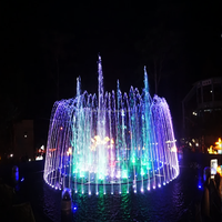 Fontaine combinée en acier inoxydable avec sculpture de lotus et jets LED RGB DMX512 pour projet de place publique emblématique