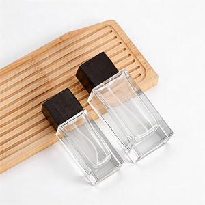 Flacons de parfum carrés transparents à paroi épaisse anti-fuite avec bouchons noirs 50ml 100ml pour le stockage de parfums – Modernes, uniques, vente en gros - Product Image 1