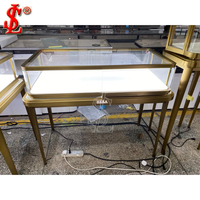 Table de présentation de bijoux en métal doré de luxe, vitrine moderne en verre avec tiroir verrouillable pour boutique, mobilier de vente au détail