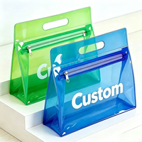 Nouvelle pochette cosmétique en PVC transparent durable avec fermeture éclair, logo personnalisé, motif lettres, avec poignée, pour cadeaux promotionnels