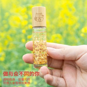 ขวดโรลออนน้ำมันหอมระเหยรูปแมวนำโชค พร้อมฟอยล์สีทอง ตัวขวดใส สำหรับบรรจุภัณฑ์ของขวัญอโรมาเธอราพี - Product Image 1