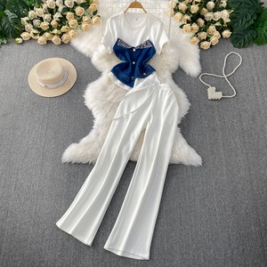 Bộ đồ hai mảnh gồm áo khoác denim ngắn kiểu Mỹ và quần ống loe cạp cao - Product Image 4