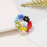 Großhandel Korea Style Phantasie kleine süße farbige Plastiks amen Reis perlen Ring elastisch verstellbare Gänseblümchen Blumen ring für Frauen Damen