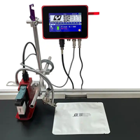 Imprimante jet d'encre thermique industrielle en ligne YAOMATEC 12,7 mm pour l'impression automatique de codes lots sur bouteilles en plastique et métaux