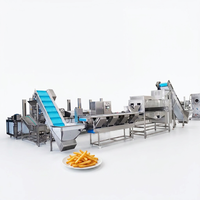 Ligne de production de frites surgelées avec système de calibrage des pommes de terre, tri de matières premières de haute qualité pour une sortie de couleur dorée