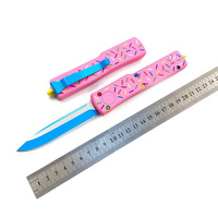 Couteau de poche EDC UT85 en acier 440C avec manche en alliage de zinc rose en forme de beignet pour le camping et la chasse en extérieur – Vente en gros pour petites commandes