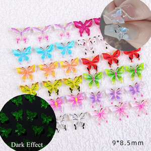Nouveauté : 50 pièces/sac, breloques 3D papillon pour nail art, papillons colorés lumineux pour nail art - Product Image 2