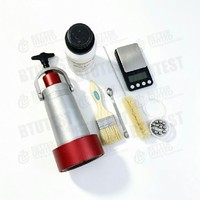 Kit de prueba de humedad rápida ASTM para suelos con método de carburo de calcio, bolas de acero y báscula digital para ensayo de arena y agregados en campo.