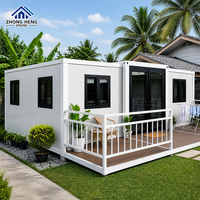 Maison modulaire préfabriquée de 20, 30 ou 40 pieds avec porche avant, terrasse et porte d'entrée vitrée pour une vie de villégiature – Maison conteneur