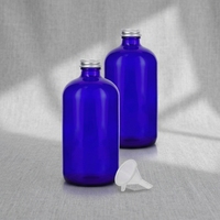 Bouteille en verre bleue en gros pour jus, boissons gazeuses, tequila, boissons à base de canne à sucre et jus fermentés