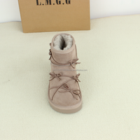 Bottes d'hiver allemandes en fourrure de mouton de style UGG de haute qualité L.M.G.G OEM ODM pour femmes, à bout large, respirantes, antidérapantes, authentiques