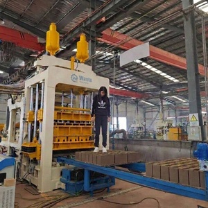 Ligne de production de blocs de béton automatique professionnelle QT15-15, <span class=keywords><strong>robot</strong></span> de palettisation haute capacité, type palette, usine de ciment - Product Image 1