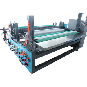 Machine à plier les serviettes hygiéniques entièrement ou semi-automatique à haute efficacité avec PLC et moteur, capacité de production de 220/min - Product Image 1