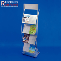 Étagère de présentation de livres au sol avec conception avant inclinée pour un accès facile dans les librairies de bibliothèques et les magasins de détail éducatifs