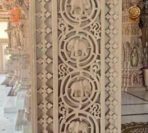 Traditional Indian Temple Column Adorned with Ornate Elephant Motif Carvings and <b>Decorative</b> Elements - Product Image 1