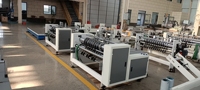 Machine à découper les cloisons en carton ondulé à grande vitesse automatique QHPACK