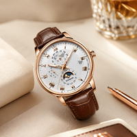 Montre de luxe pour homme à cadran en verre quartz, bracelet en cuir, boîtier en alliage, avec breloque lune ciel étoilé 20 mm et calendrier à trois aiguilles, livrée en coffret