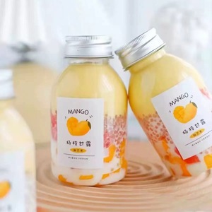 Vaso de plástico Botellas de jugo Botella de jugo de plástico <span class=keywords><strong>PET</strong></span> vacía Botella de bebida redonda única transparente sin BPA con tapas - Product Image 6