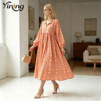 Fabrication OEM Robe midi coupe trapèze à taille haute, col à revers, manches lanternes, imprimé floral orange, vente en gros d'usine