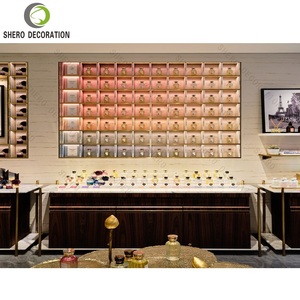 Magasin Custom Profumeria Armoire de rangement de <span class=keywords><strong>parfums</strong></span> de luxe Étagère murale de présentation de <span class=keywords><strong>parfums</strong></span> haut de gamme en acier inoxydable doré - Product Image 5
