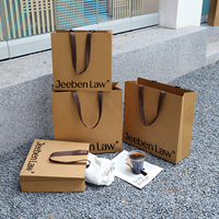 Sac de shopping en papier kraft imprimé personnalisé, emballage de gants haut de gamme, ruban réutilisable, boîte de luxe écologique, marquage à chaud, 1 pièce MOQ
