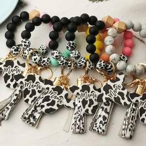 Nouveau bracelet en perles <span class=keywords><strong>de</strong></span> silicone pour hommes porte-clés <span class=keywords><strong>de</strong></span> style occidental tête <span class=keywords><strong>de</strong></span> vache à <span class=keywords><strong>copeaux</strong></span> <span class=keywords><strong>de</strong></span> <span class=keywords><strong>bois</strong></span> MAMA - Product Image 6