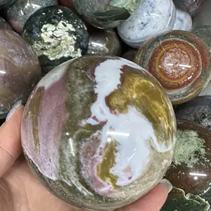 Venta al por mayor roca natural cristales pulidos esfera piedras curativas océano jaspe bola piedras para Decoración