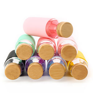 Nuove idee di Design di moda 2024 coperchio di bambù bottiglia d'acqua di <span class=keywords><strong>vetro</strong></span> con manicotto in Silicone personalizzato il tuo Logo - Product Image 6