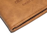 Porte-passeport de luxe de voyage portable Couverture de document de blocage personnalisée avec motifs en matériau PU