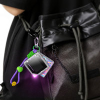 Vente directe d'usine, console de jeu portable avec jeu d'action ACT, design élégant de porte-clés, mini appareil de jeu créatif, modèle CT-M2