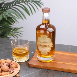 Botella de vidrio de licor de whisky Bourbon de Ron transparente Super Flint de alta calidad de 700ml con corcho Características de uso industrial Serigrafía