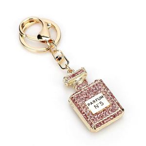 Porte-clés créatif vintage en métal, pendentif de voiture en strass, flacon de parfum imprimé en émail, sac pour femme avec impression offset - Product Image 2