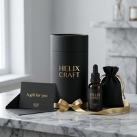 Boîte ronde en carton rigide en papier d'art de luxe pour l'emballage de lotions corporelles et de kits de soins de la peau, fabrication sur mesure
