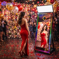 Photomaton instantané compatible SLR avec design de bordure fin et élégant, doté de roues et d'un cadre métallique