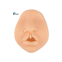 Modèle d'enseignement médical: Modèle bilatéral complet de fente labiale de silicone pour la formation chirurgicale de suture