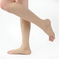Chaussettes de compression sportives, hautes jusqu'aux cuisses, en nylon tricoté, élastiques, antidérapantes, support ODM, unisexe, antibactériennes, absorbant la transpiration