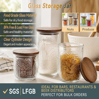 Pot en verre cylindrique de luxe au design personnalisé avec couvercles en bambou et couvercle hermétique 700 ml pour le stockage alimentaire en cuisine et pour les fêtes